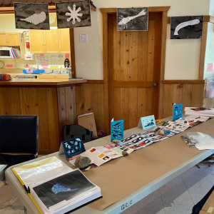 An art/science table at the Quadra Island Community Center encourages visitors to be inspired and to create based on their surroundings and the diversity of life on Quadra Island.