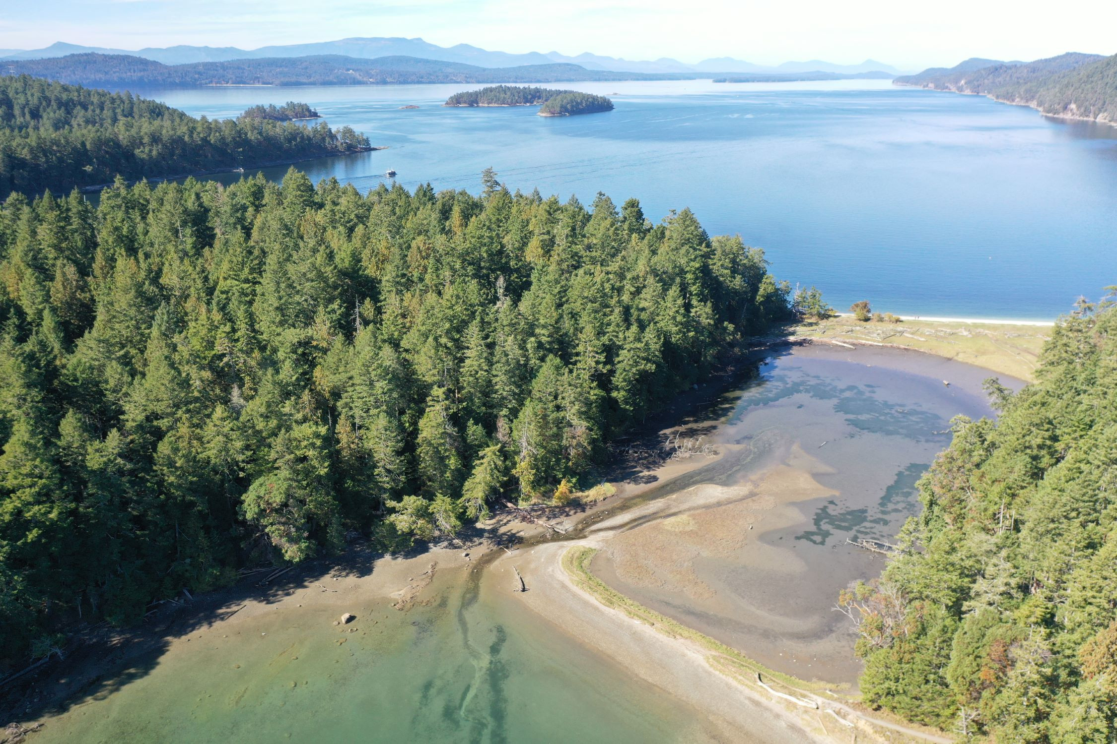 Marine habitat diversity at Sumnuw (Montague Harbour) includes shell beaches, tidal mudflats, and salt marshes.